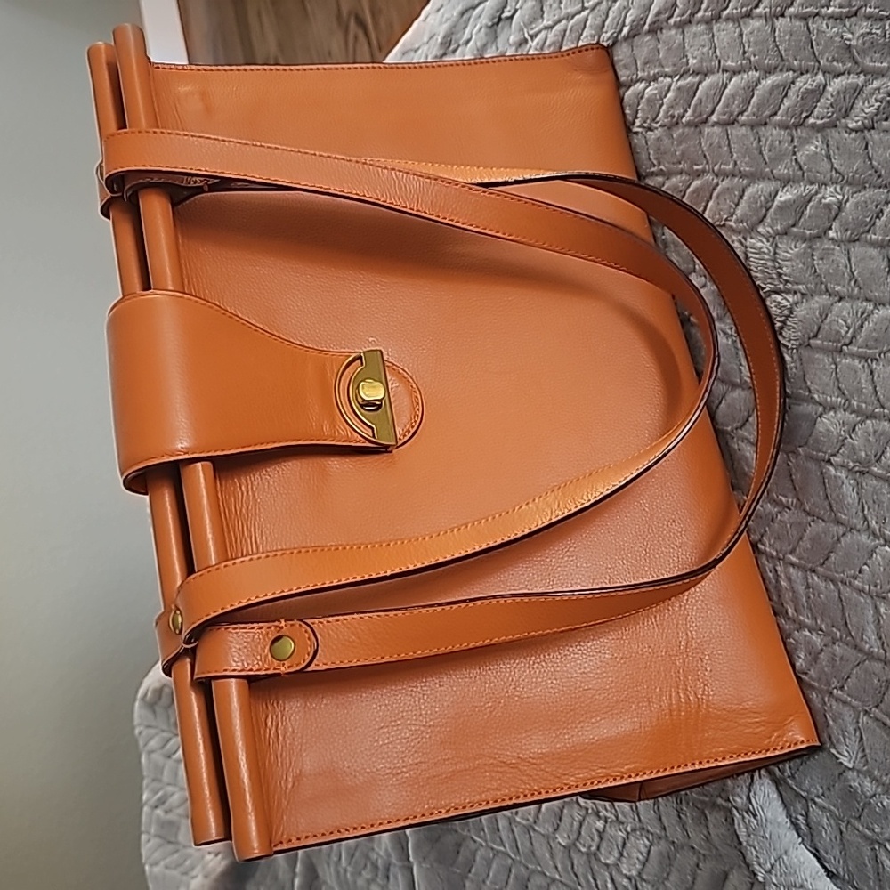 ANTONIO MELANI gold tone hand bag